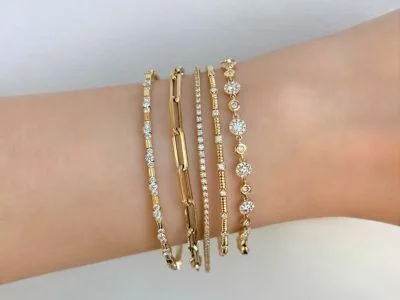 A women wear diamond Bracelets on her wrist